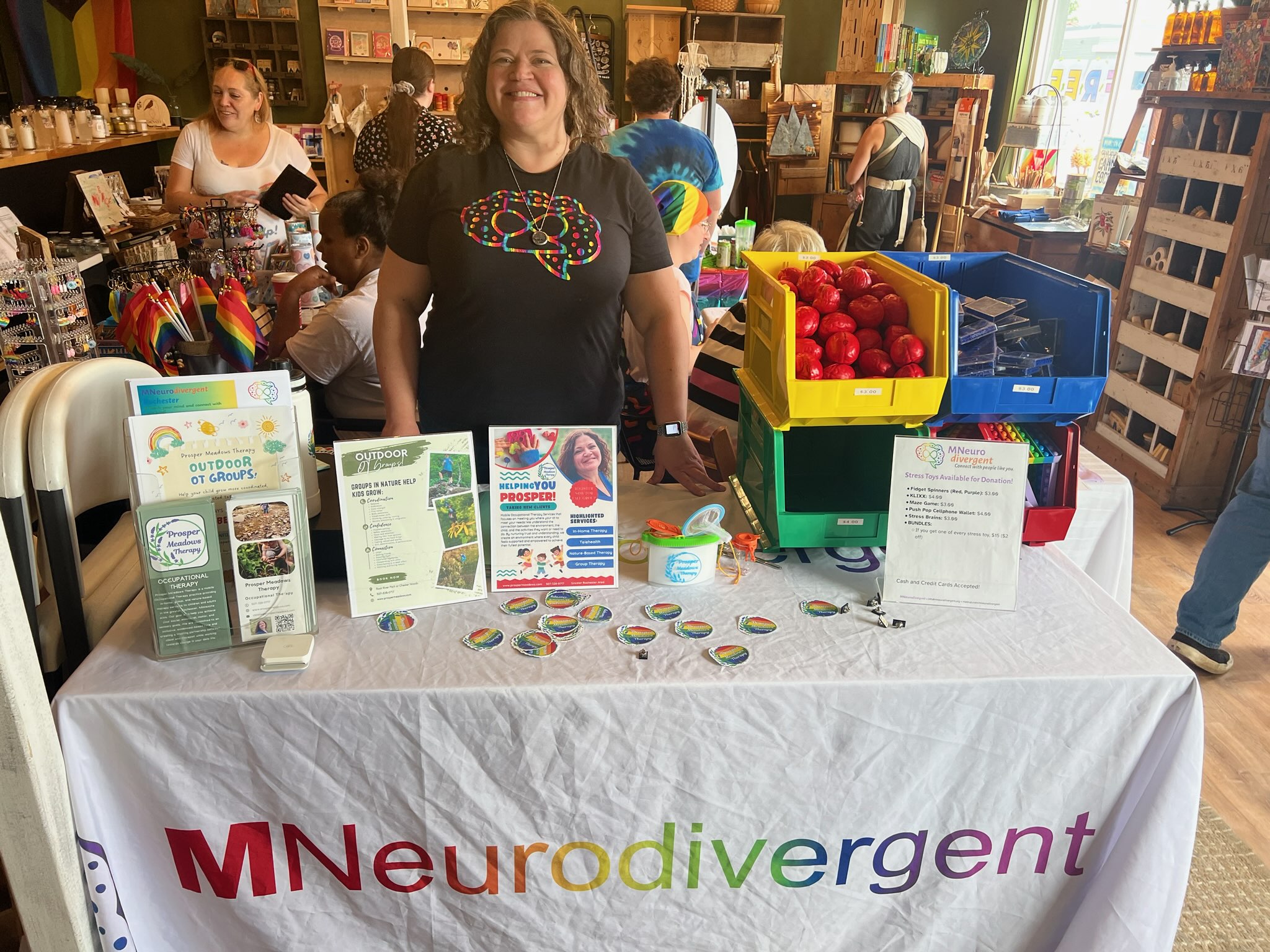 Community coordinators supporting a local neurodivergent community.